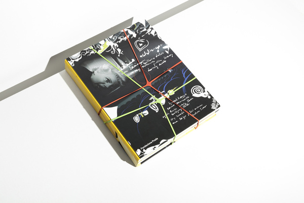 Two books held together by cross-rubber-bands